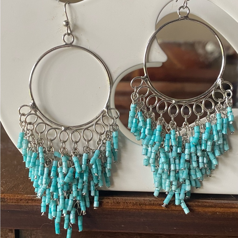 Turquoise gem stone beads. Chain link hoop earrings.
